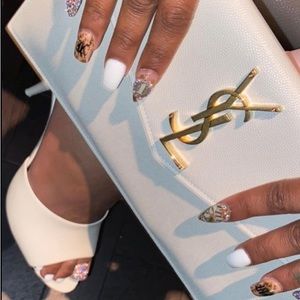 YSL envelope clutch. Comes with dust bag, authenticity card and original box!